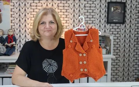 Örgü ile Yapılan Çok Tarz Kız Yelek Modeli
